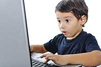 boy using computer